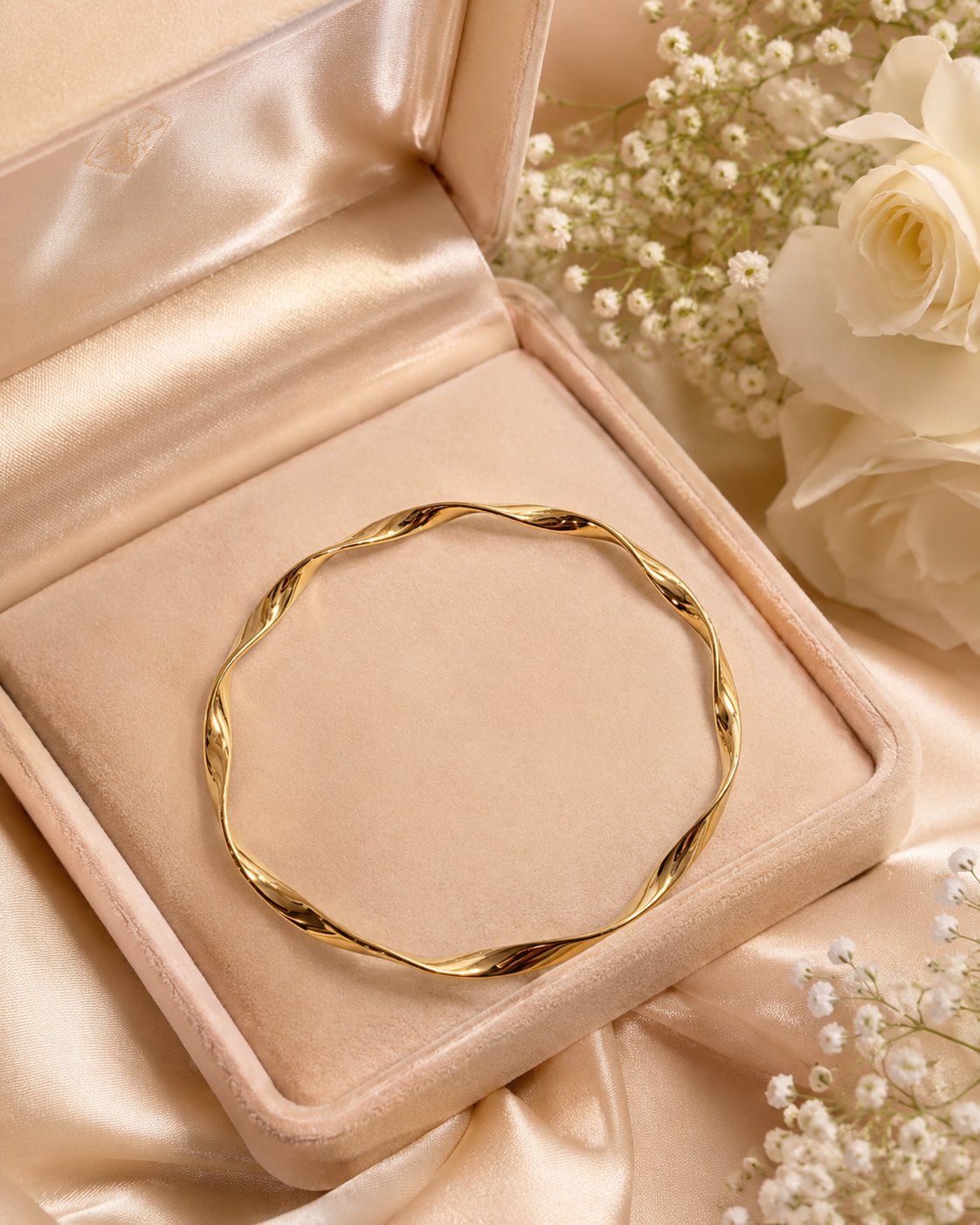 Sculpted Twist Gold Bangle
